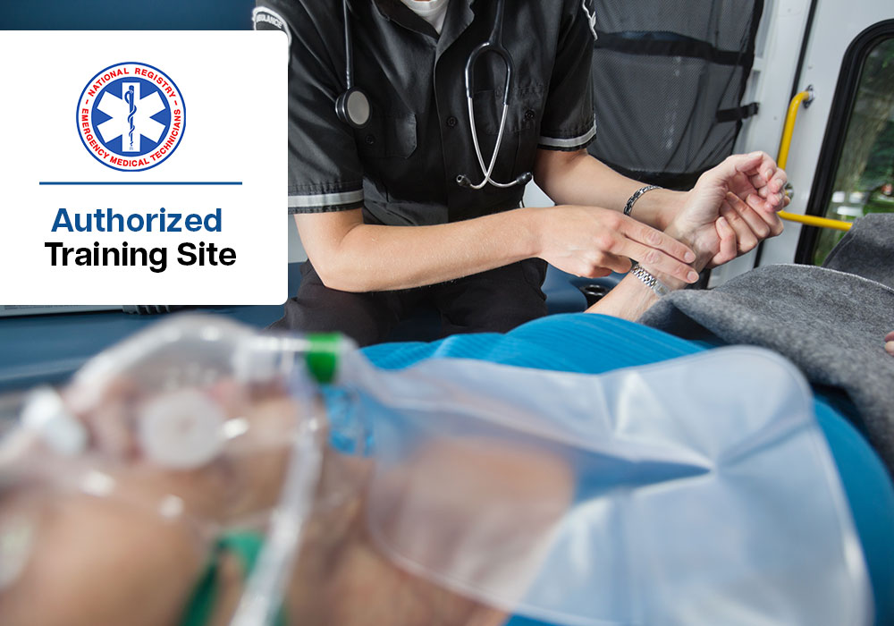 Student Taking Patient’s Vital Signs Paramedic student measuring a patient’s vital signs during training